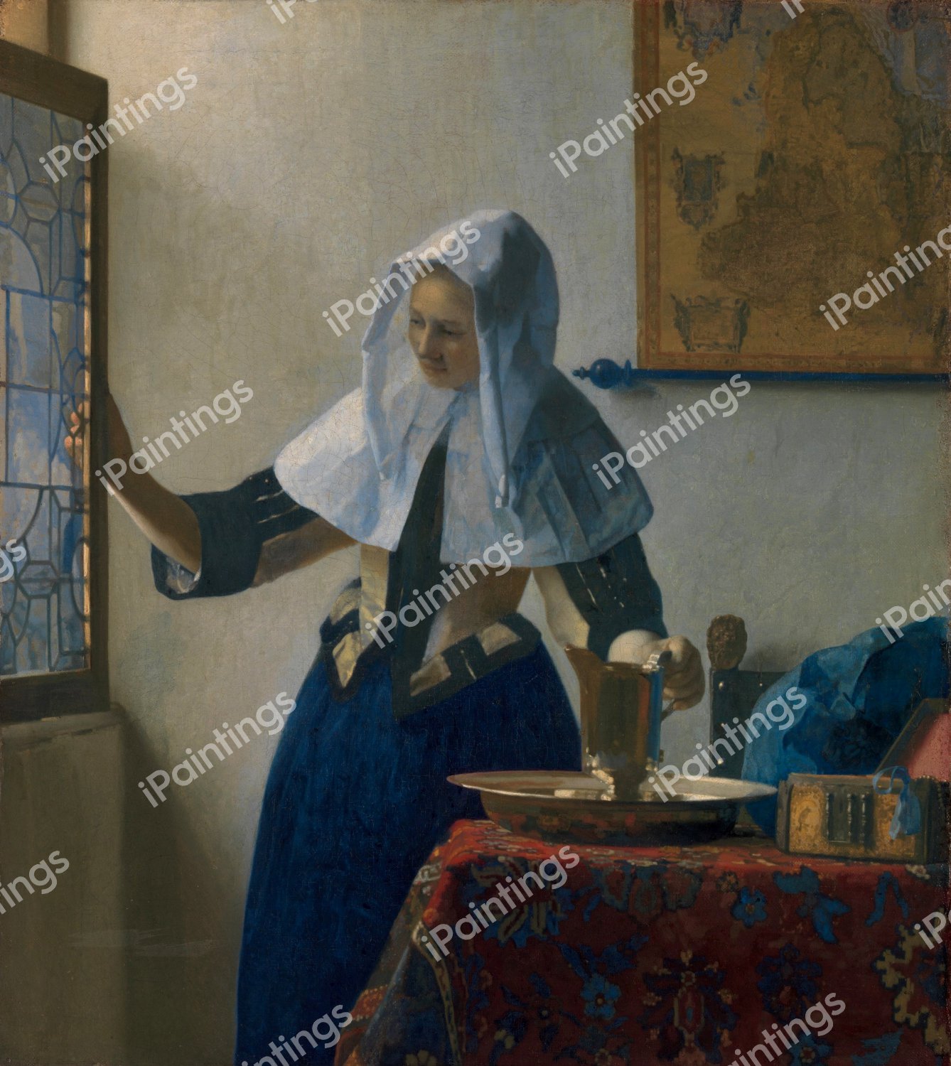 The Young Woman with a Water Pitcher. The painting by Jan Vermeer