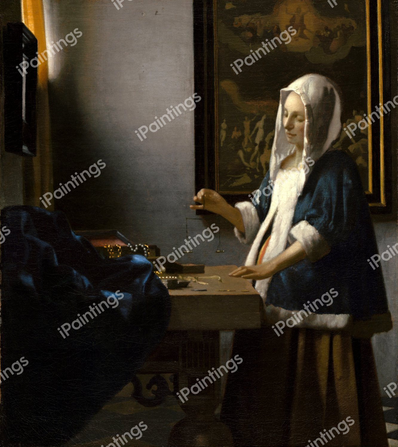Woman Holding a Balance. The painting by Jan Vermeer