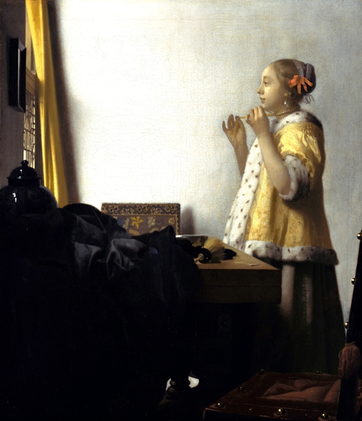 Young Woman with a Pearl Necklace. The painting by Jan Vermeer