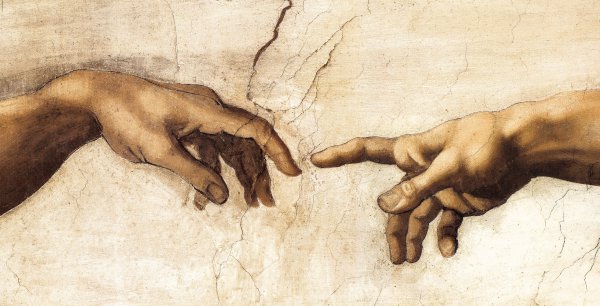 The Hands of God and Adam. The painting by Michelangelo